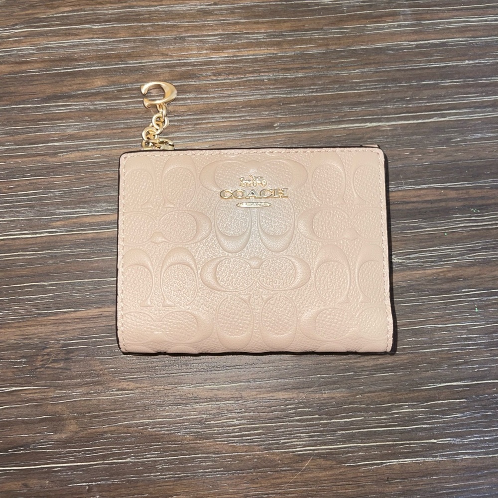 Tan Coach Wallet with Burgundy Interior